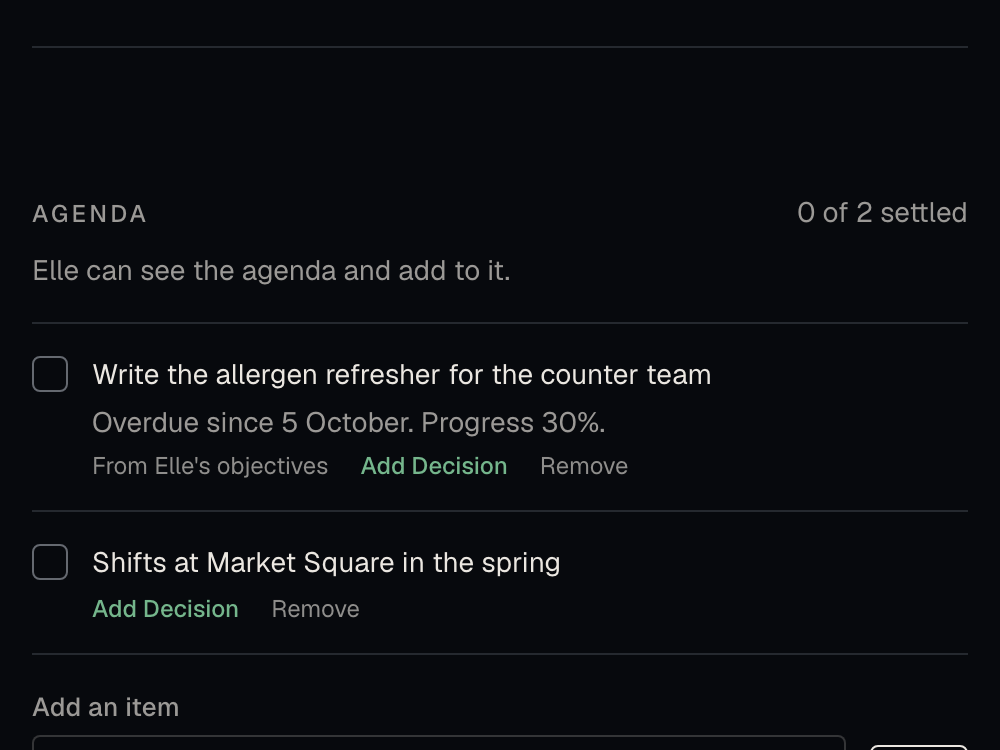 A check-in agenda with two items: Elle’s overdue objective, added automatically at 30% progress, and a topic her manager added.