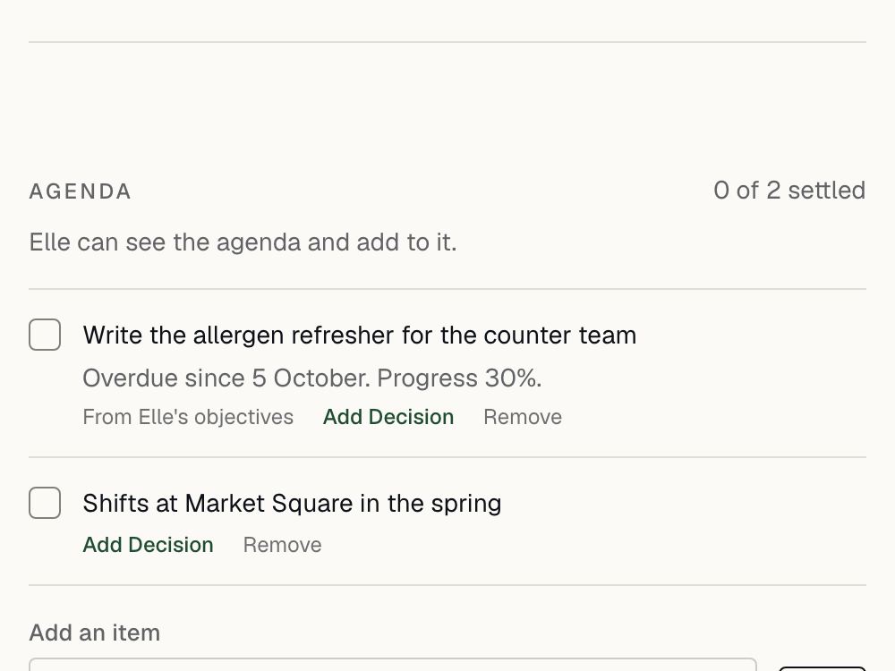 A check-in agenda with two items: Elle’s overdue objective, added automatically at 30% progress, and a topic her manager added.