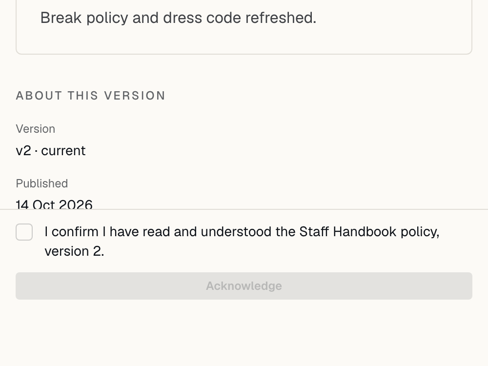 A staff handbook policy open at version two, with a confirmation tick box and an Acknowledge button.